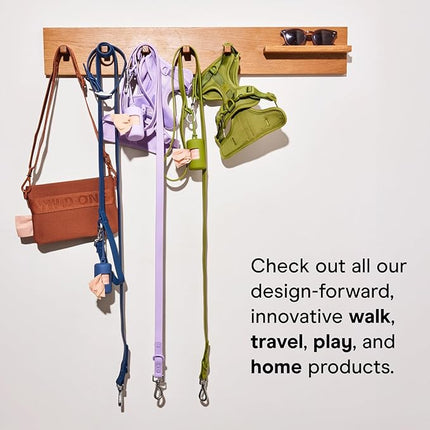 Wild One Dog Poop Bag Holder and Dispenser with Leash Attachment, Leak Proof, Easy Twist Top for Refills, Includes 1 Roll Bags, Black